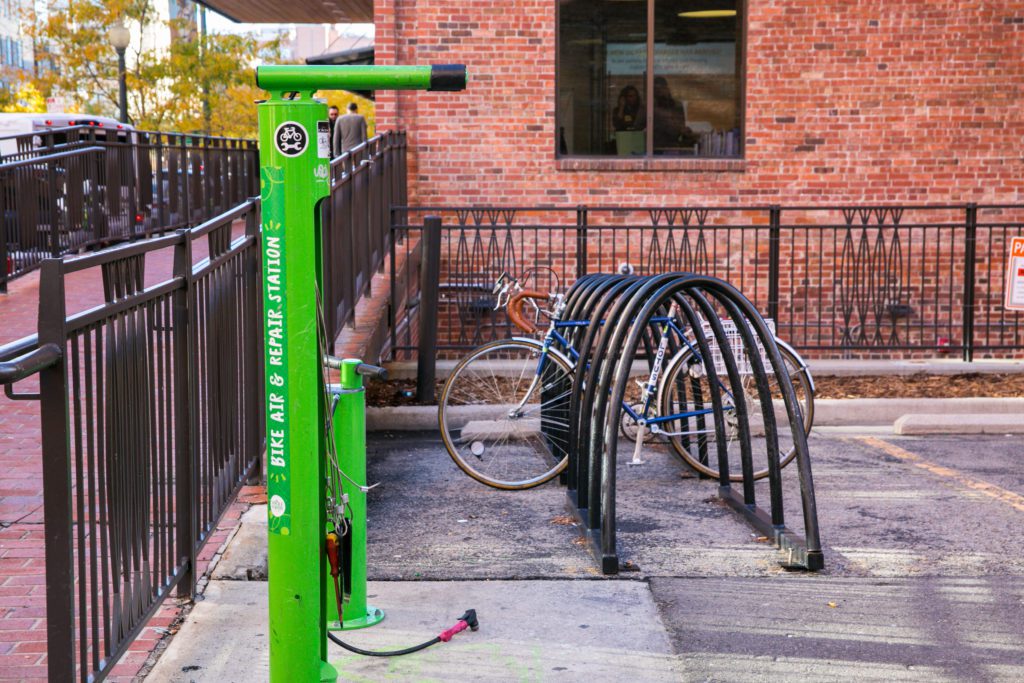 Bike rack with pump and fixit station at the Alliance Center.